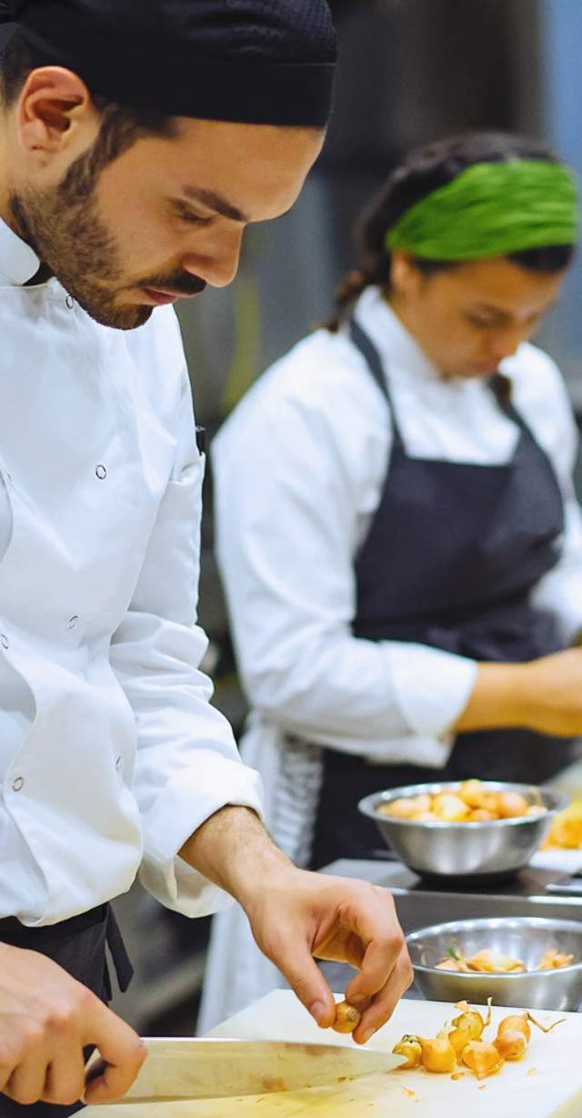 Cooks preparing food