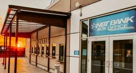 The NBT Bank Box Office at the Mohegan Arena at Casey Plaza during sunset