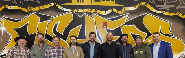 Turnpike Troubadours in front of Chromatic Collective Mural