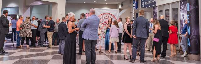 Guests mingling in front of the concourse entrance for the Sioux Falls Arena