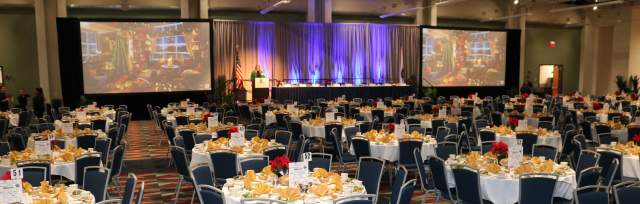 Round tables and chairs set up in the Grand Ballroom