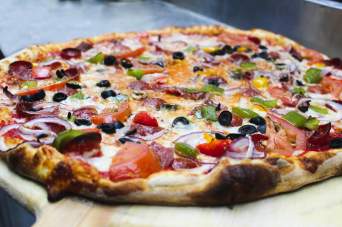 Experience the bold flavors of Buffalo, NY, with every slice at Capo's Pizzeria