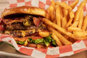 Earl Abel's jalapeño bacon burger is a fiery twist on a classic favorite