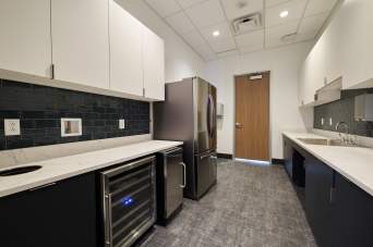 Our exclusive boardroom comes equipped with a private kitchen
