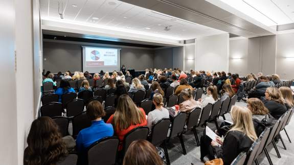 Meeting Room full of attendees for a breakout session