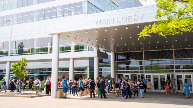Attendees for an event waiting outside of the main lobby entrance to Denny Sanford Premier Center
