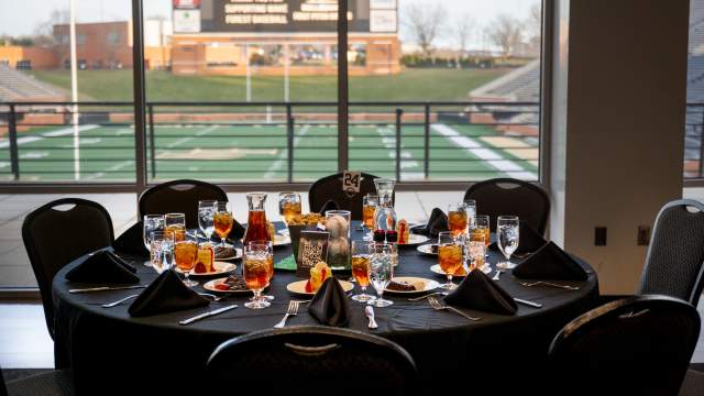 A table setting with drinks and desserts