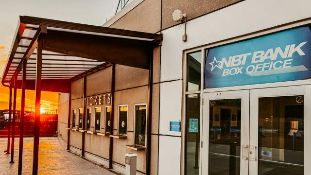 The NBT Bank Box Office at the Mohegan Arena at Casey Plaza during sunset