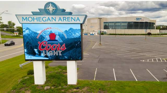 Aerial photo of the outdoor marquee with the Mohegan Arena at Casey Plaza in the background
