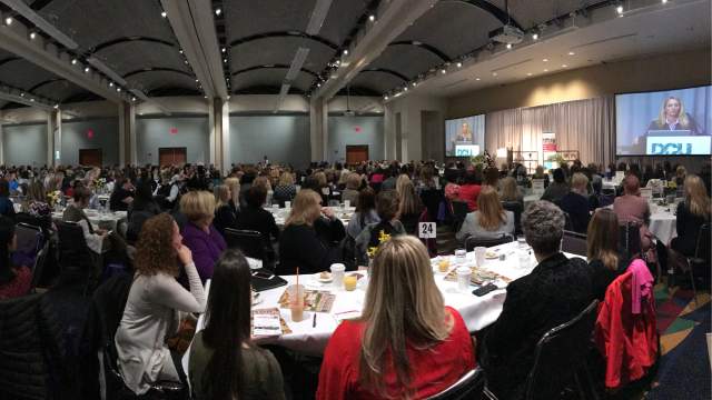 Guests at an event inside the ballroom