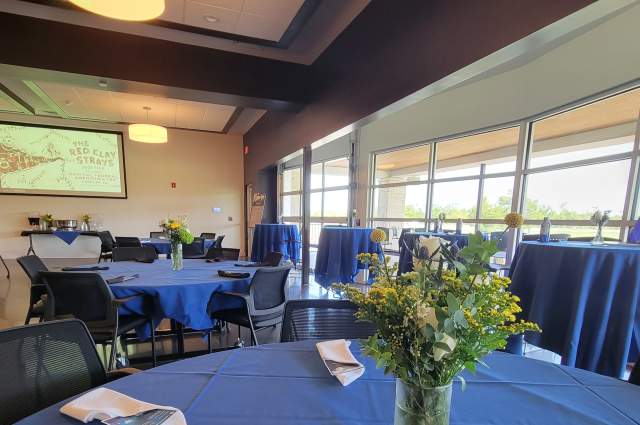 Tables with linens and flowers for rent