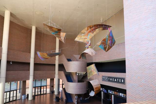 Seven Generations sculpture by Nora Hutchinson Johnson - Hanging sculpture in theater lobby