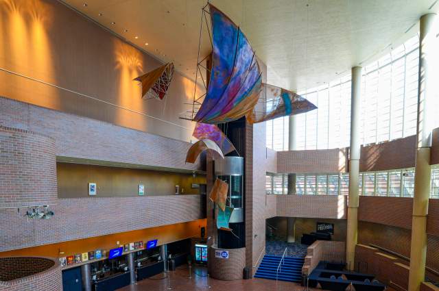 Seven Generations sculpture by Nora Hutchinson Johnson - Hanging sculpture in theater lobby
