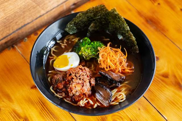 Immerse yourself in a bowl of comfort with our flavorful ramen, featuring rich broth, tender noodles, and a variety of toppings for a truly satisfying meal