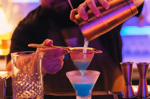 Sip on expertly crafted cocktails, a perfect blend of art and flavor