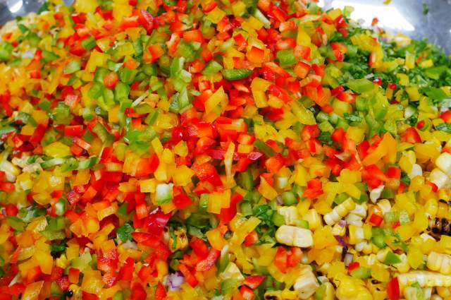 Indulge in the vibrant flavors of our fresh corn relish, a zesty accompaniment that adds a burst of freshness to our BBQ sandwiches