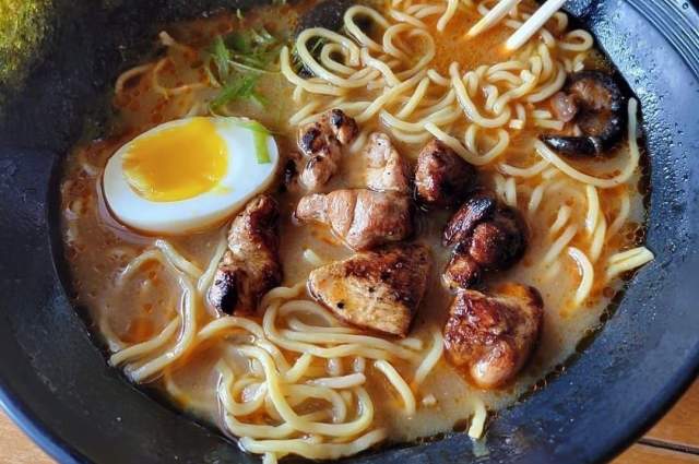 Tantalizing ramen, featuring rich, savory broth, tender noodles, and a delectable array of toppings