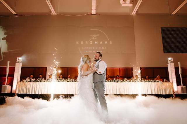 Couple Dancing in Grand Ballroom During Their Reception with Cold Sparks