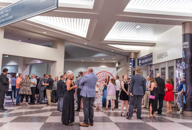 Guests mingling in front of the concourse entrance for the Sioux Falls Arena