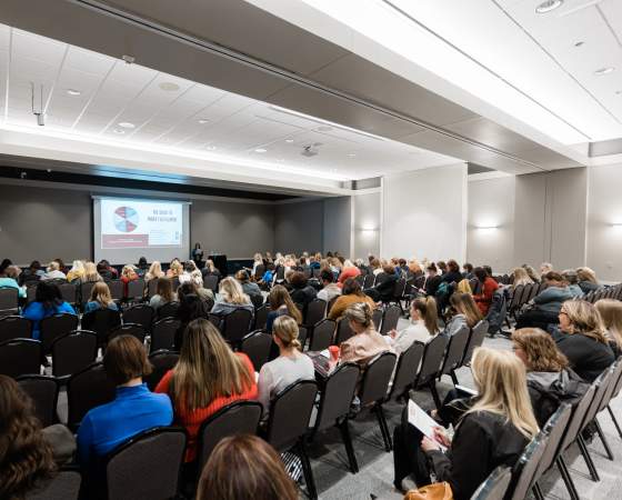 Meeting Room full of attendees for a breakout session