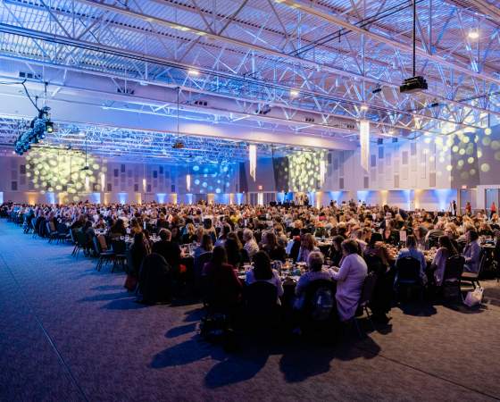 Decorated Exhibit Halls with People for Banquet