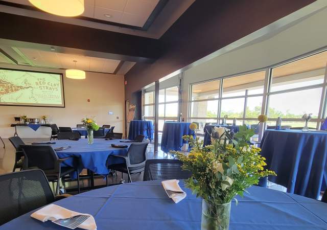 Tables with linens and flowers for rent