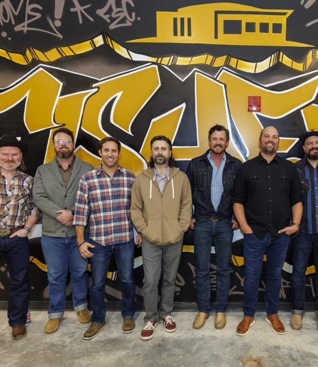 Turnpike Troubadours in front of Chromatic Collective Mural