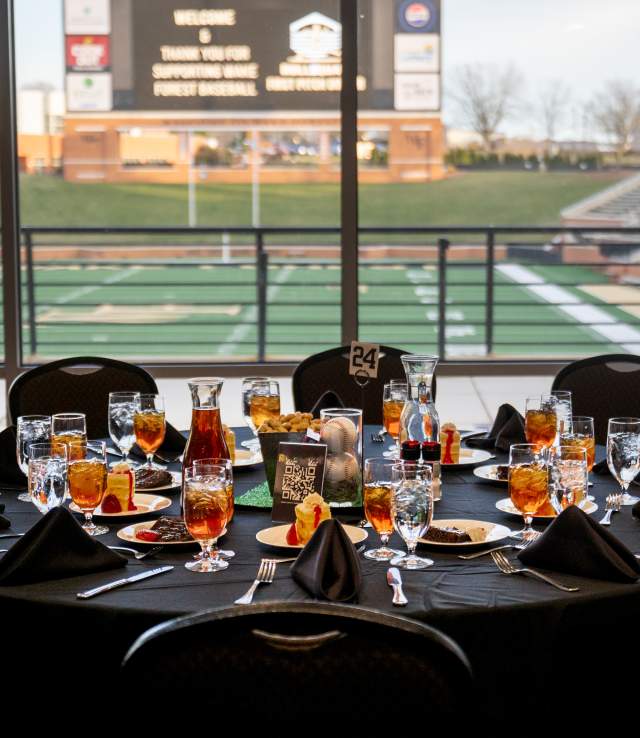 A table setting with drinks and desserts