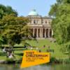 Pittville Pump Room in Cheltenham with Visit Cheltenham logo