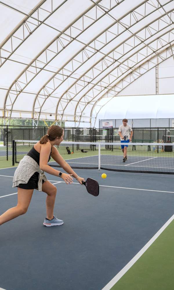 People playing pickleball
