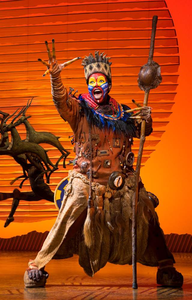 A scene from Broadway's The Lion King featuring Rafiki