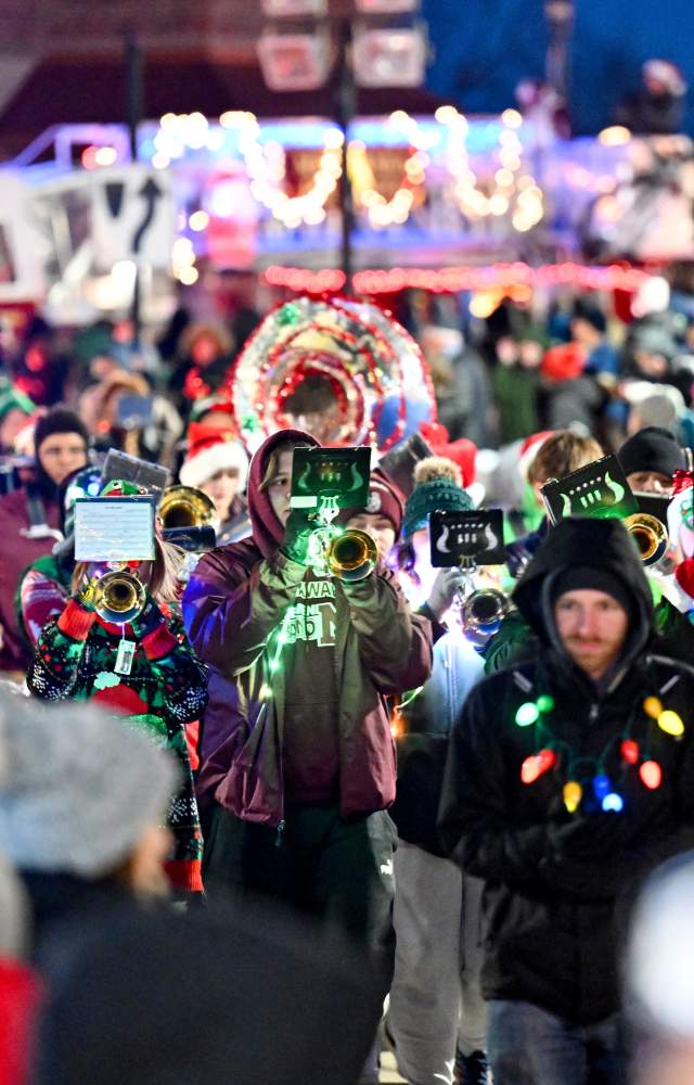 Marching band marches during Mishawaka Winterfest Parade