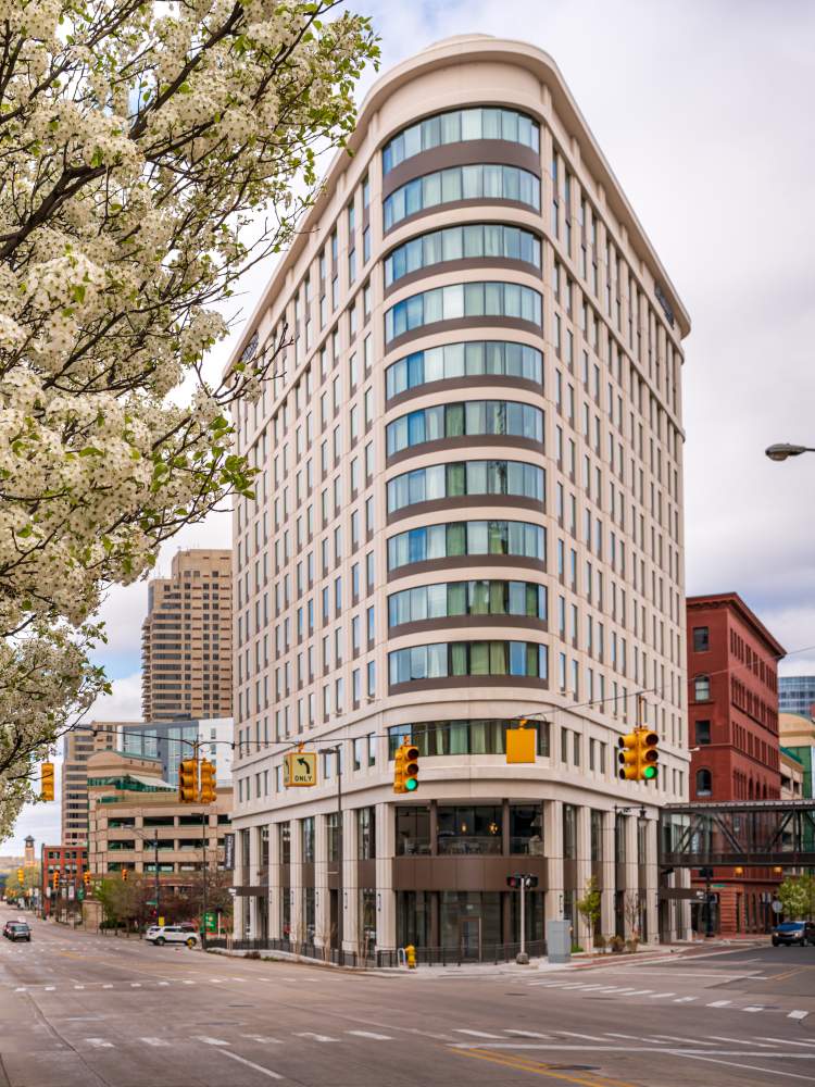 Trees blooming on a cloudy Spring day across from the Residence Inn.