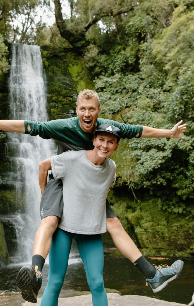 Couple in front of waterfall