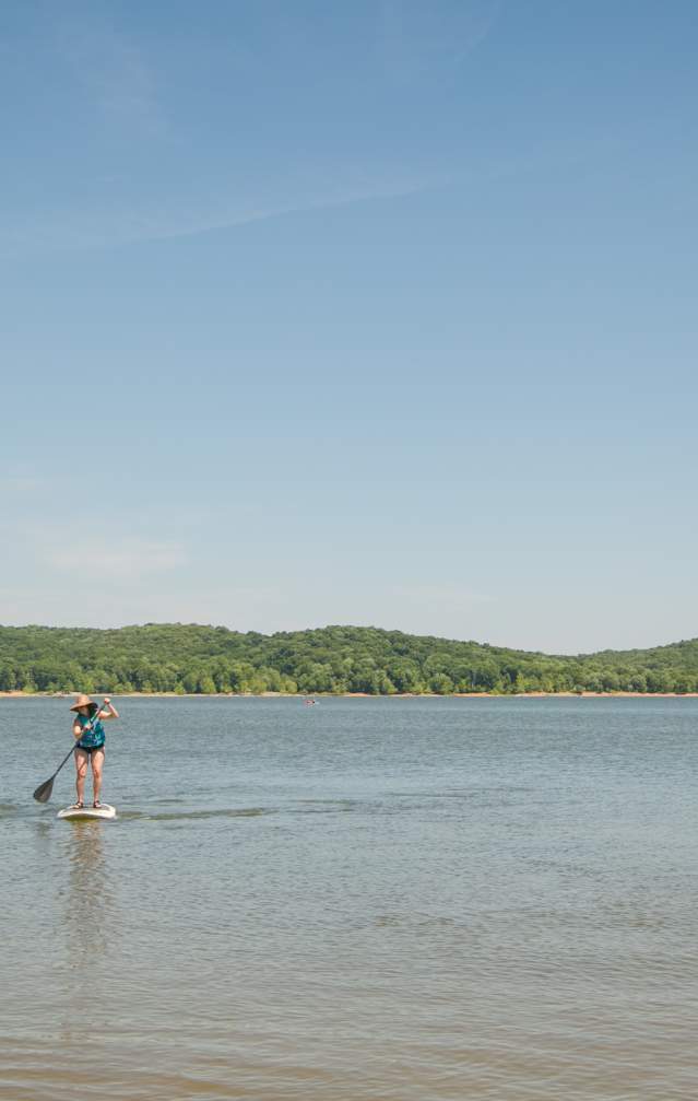 Two people paddleboarding on Monroe Lake