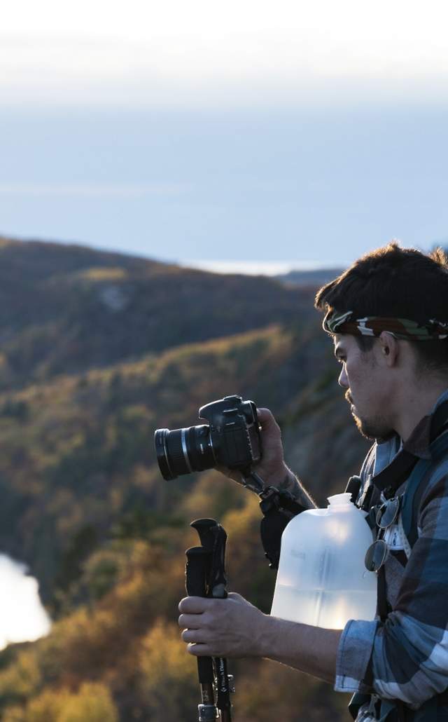 Photographer taking photos during fall color in the Upper Peninsula of Michigan