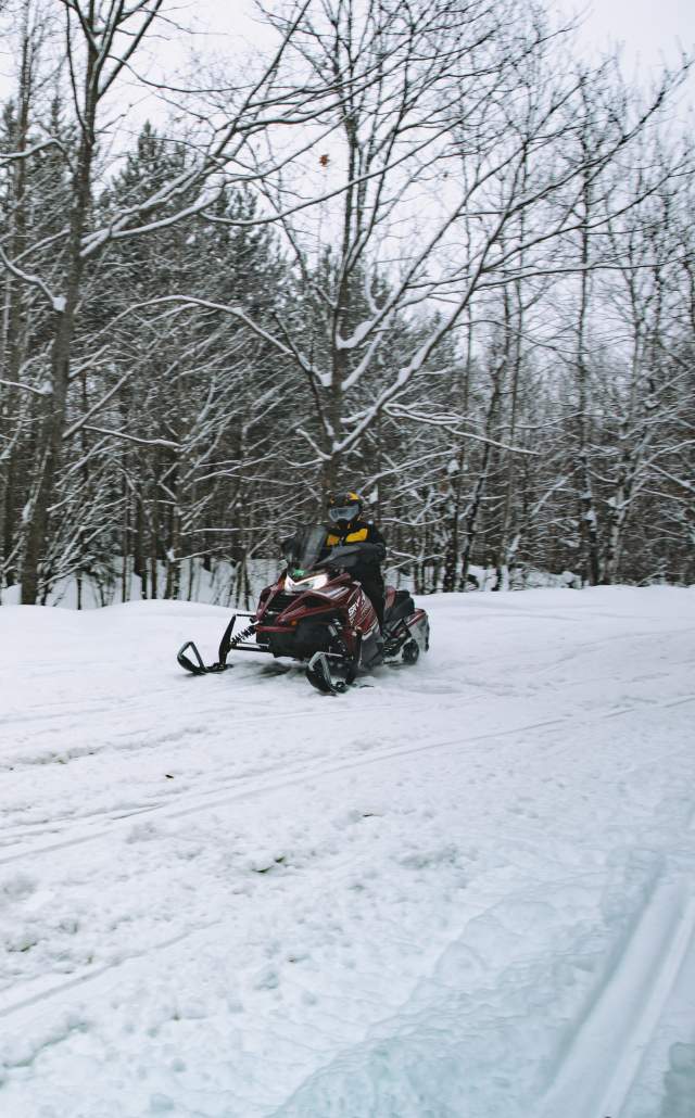 A snowmobile on a trail after a fresh snowfall in the Upper Peninsula of Michigan