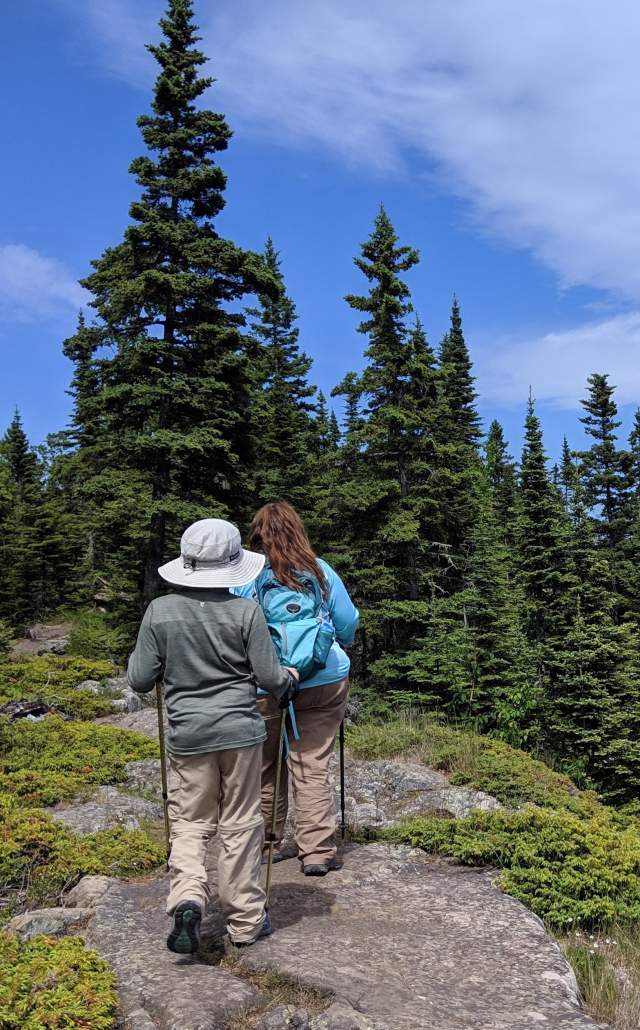 Two people hiking at Isle Royale National Park, The Upper Peninsula, Michigan