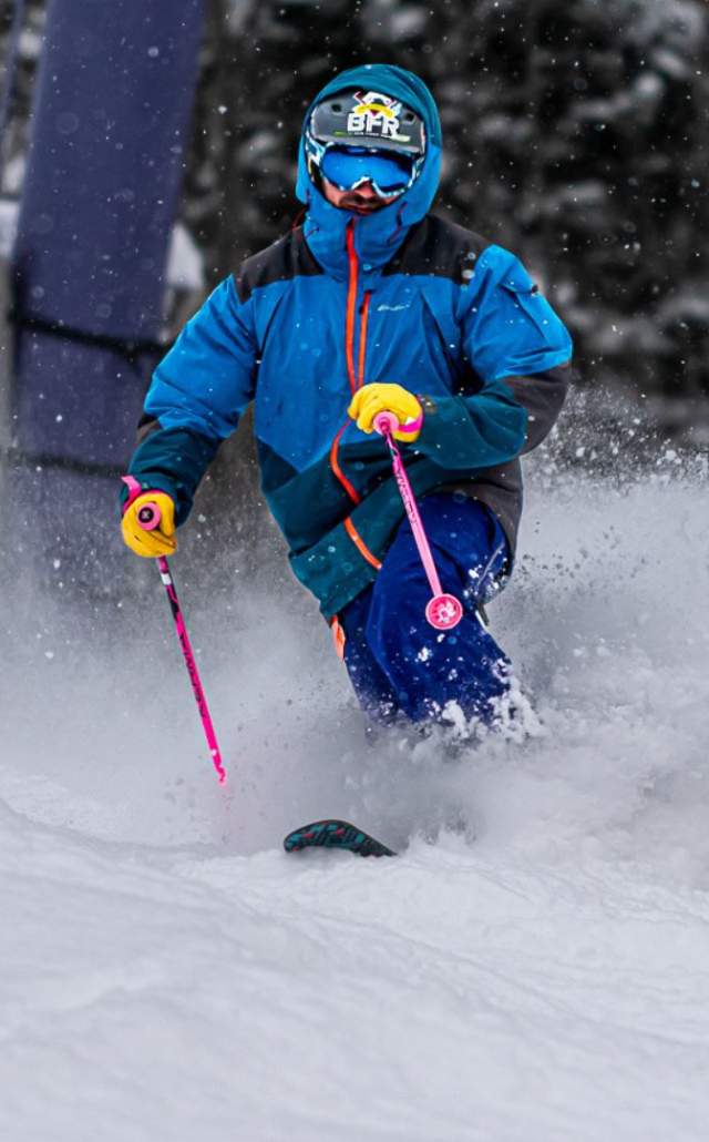 A person snowboarding in the Upper Peninsula of Michigan