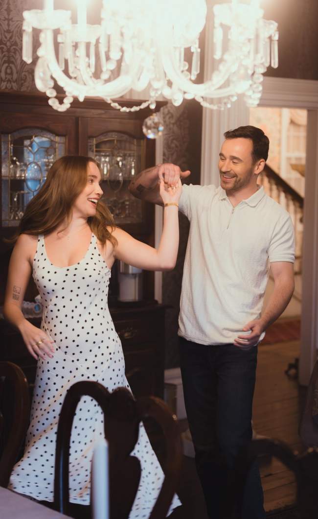 Couples dancing in a dining room