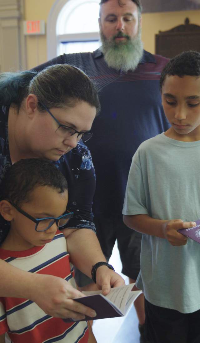A family of four visit Fayetteville's Fascinate-U Children's Museum with their Cumberland County Destination Passport