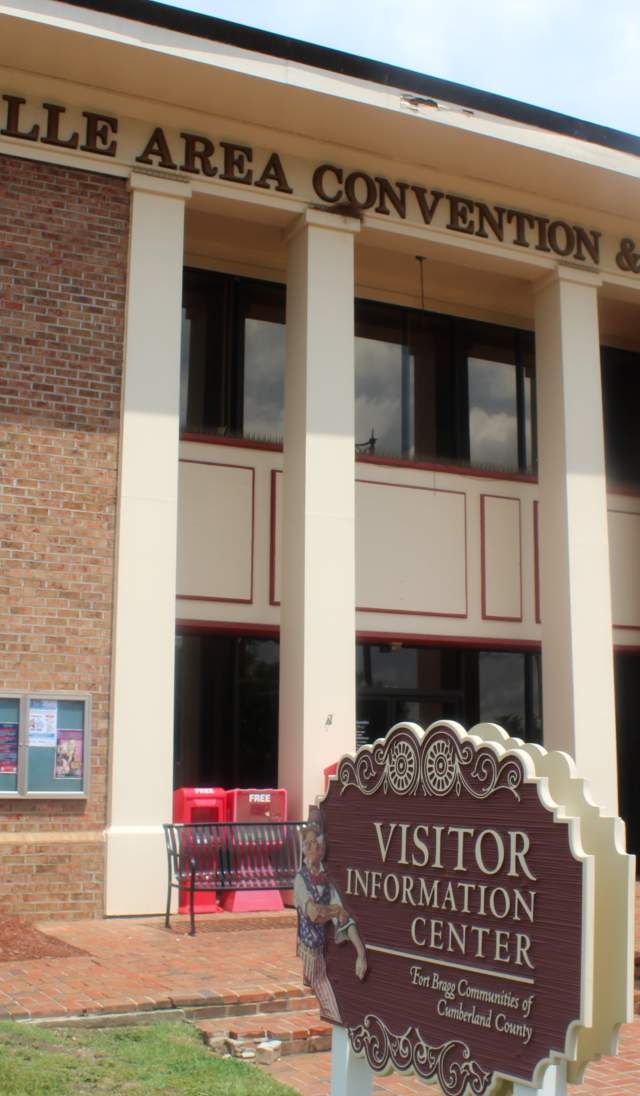 A front view image of the outside of the Person Street Welcome Center office building