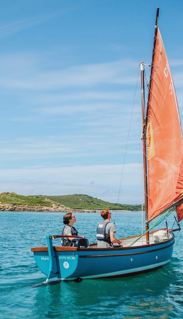Family sailing around the islands