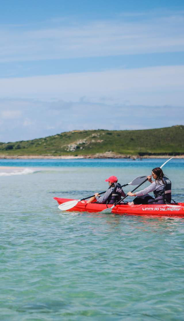 Family in kayaks