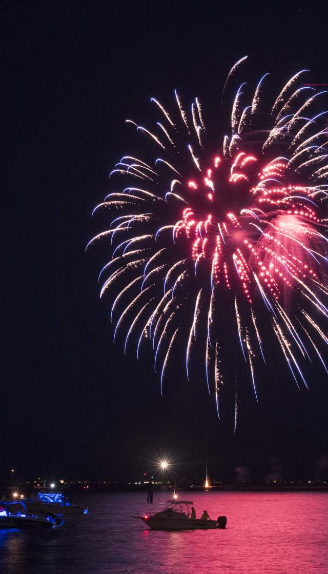 Fireworks over the Cape Fear River at NC 4th of July Festival in Southport