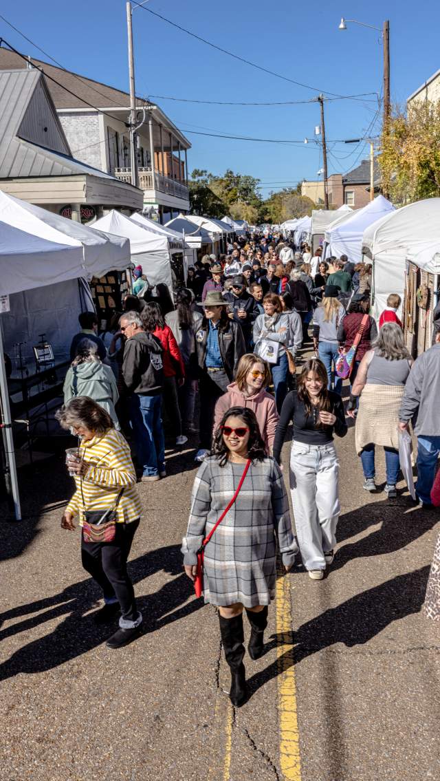 Strolling among the booths at Covington Three Rivers Art Festival