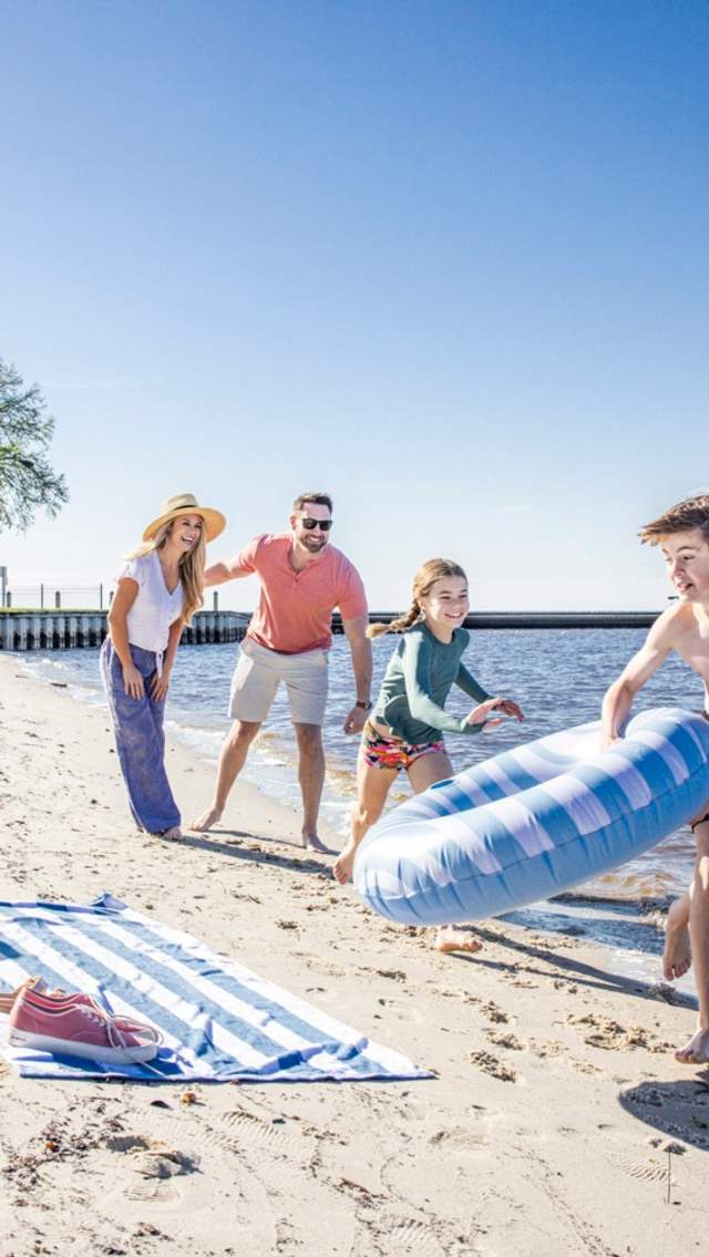 Fontainebleau State Park's sandy beach and shallow water is great for young families.