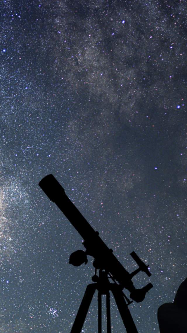 Learn more about astronomy events person with telescope