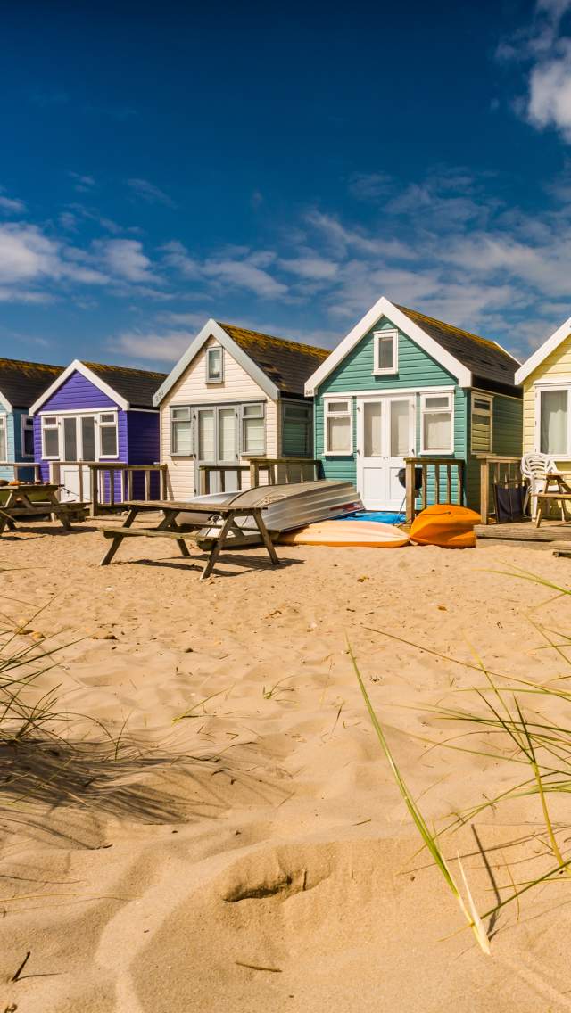 Colourful beach huts at Mudeford Sandbank, Dorset