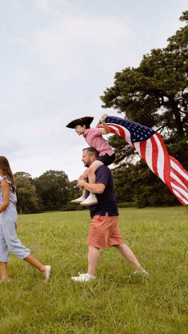 Family on Yorktown Battlefield with Flag Header